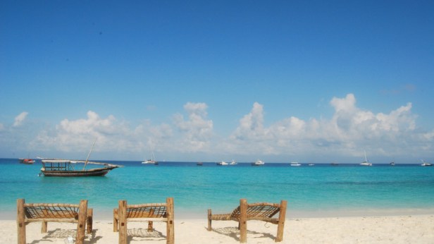 Intrepid-Travel-tanzania_zanzibar-island_beach-chairs-blue-water-sky_jess wight
